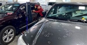 Car in shop marked for repair