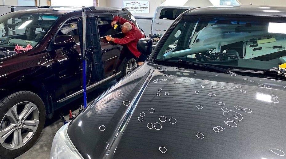 Car in shop marked for repair